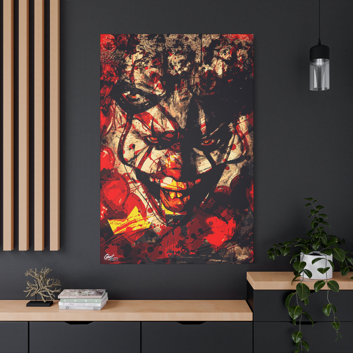 Down in a Drain oversized canvas on a charcoal wall by wood slats, leering clown face in distressed red, black and cream
