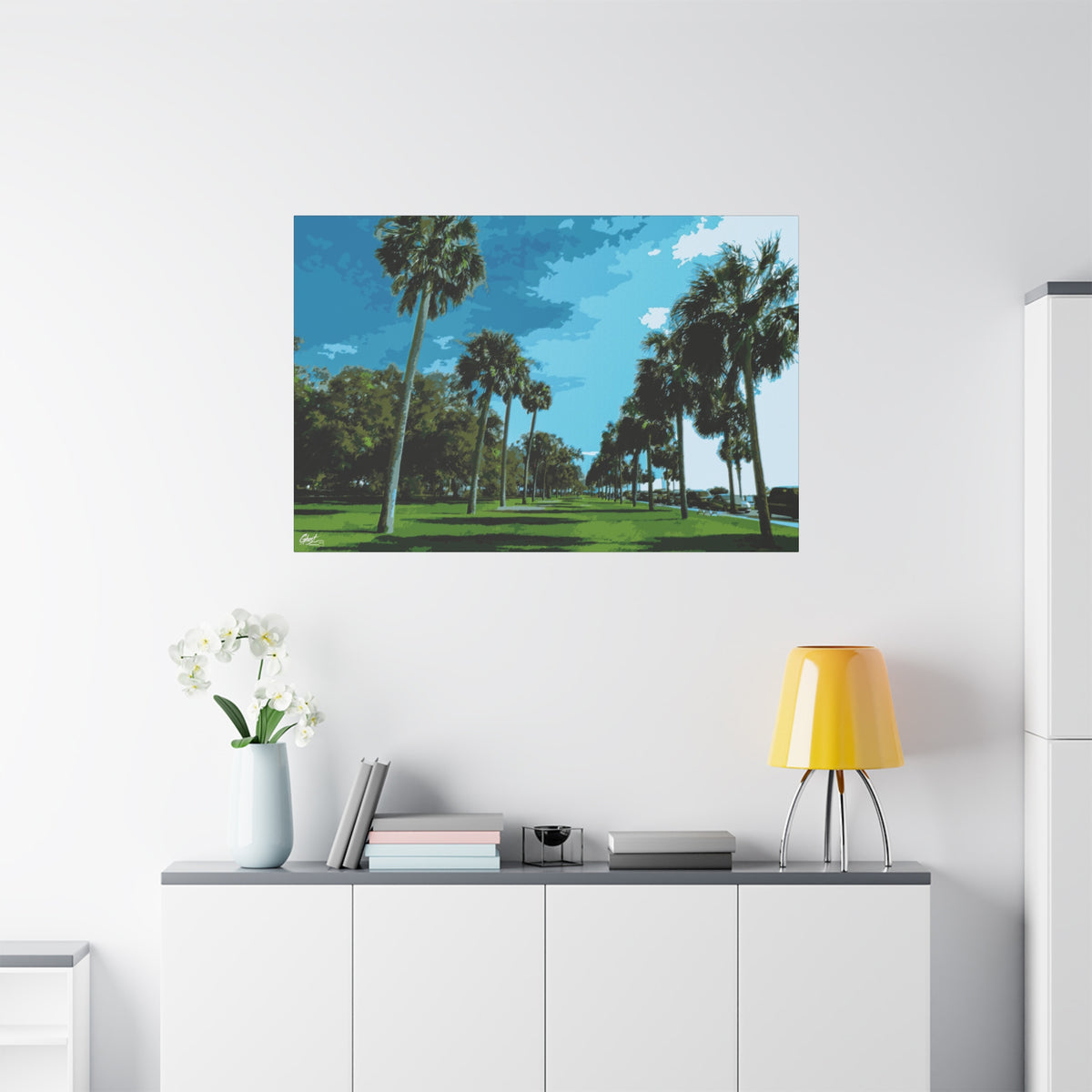 The Battery (Original) large canvas on a white wall over a sideboard, sunlit palms and long shadows by the water