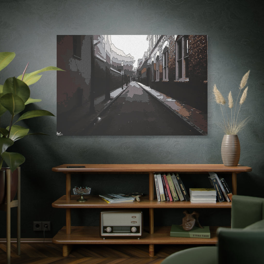 Charleston One Way oversized canvas above a wooden bookshelf, moody alley with old brick walls and long shadows