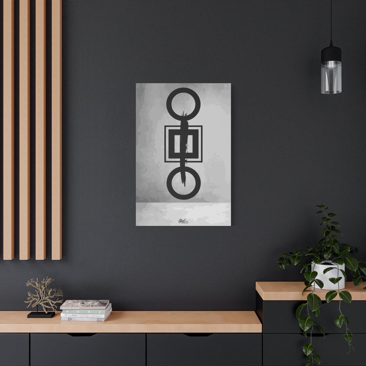 Down is Up canvas on a charcoal wall by wood slats, circles and squares crossed by a bold black brushstroke