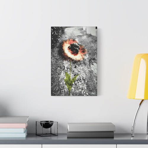 Meteor Flower large canvas beside a yellow desk lamp, pothole crater ringed in orange, red and yellow like a flower