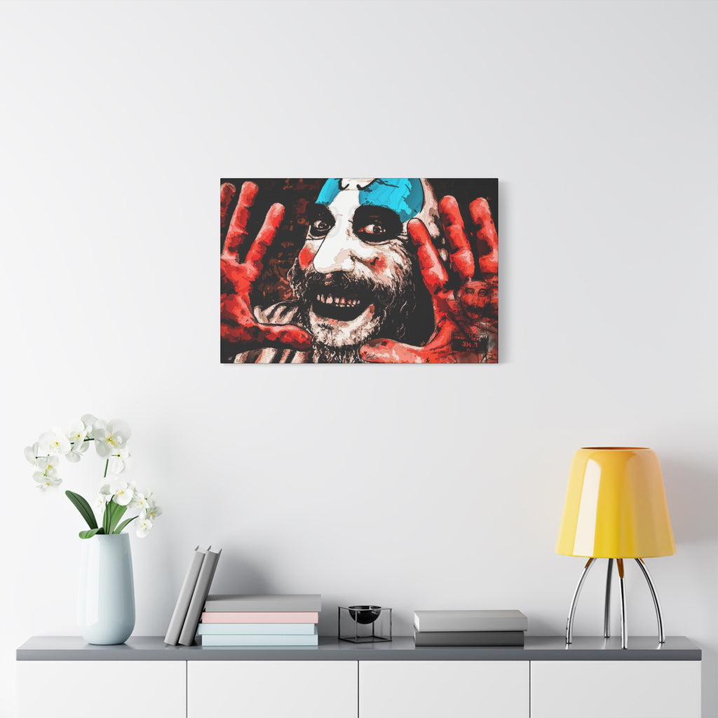 Don't Turn Your Back oversized canvas on a white wall above a console, high-contrast red and white clown portrait