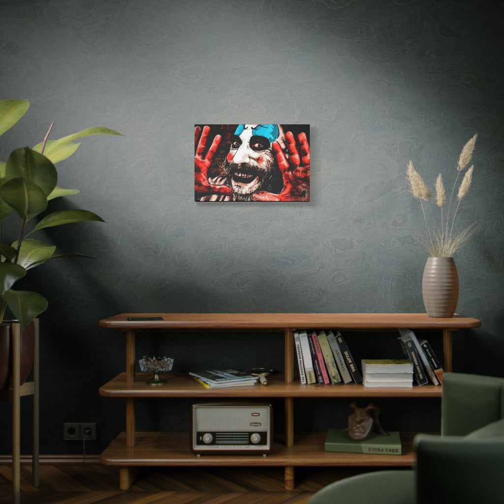 Don't Turn Your Back medium canvas above a wooden bookshelf, high-contrast red and white clown portrait