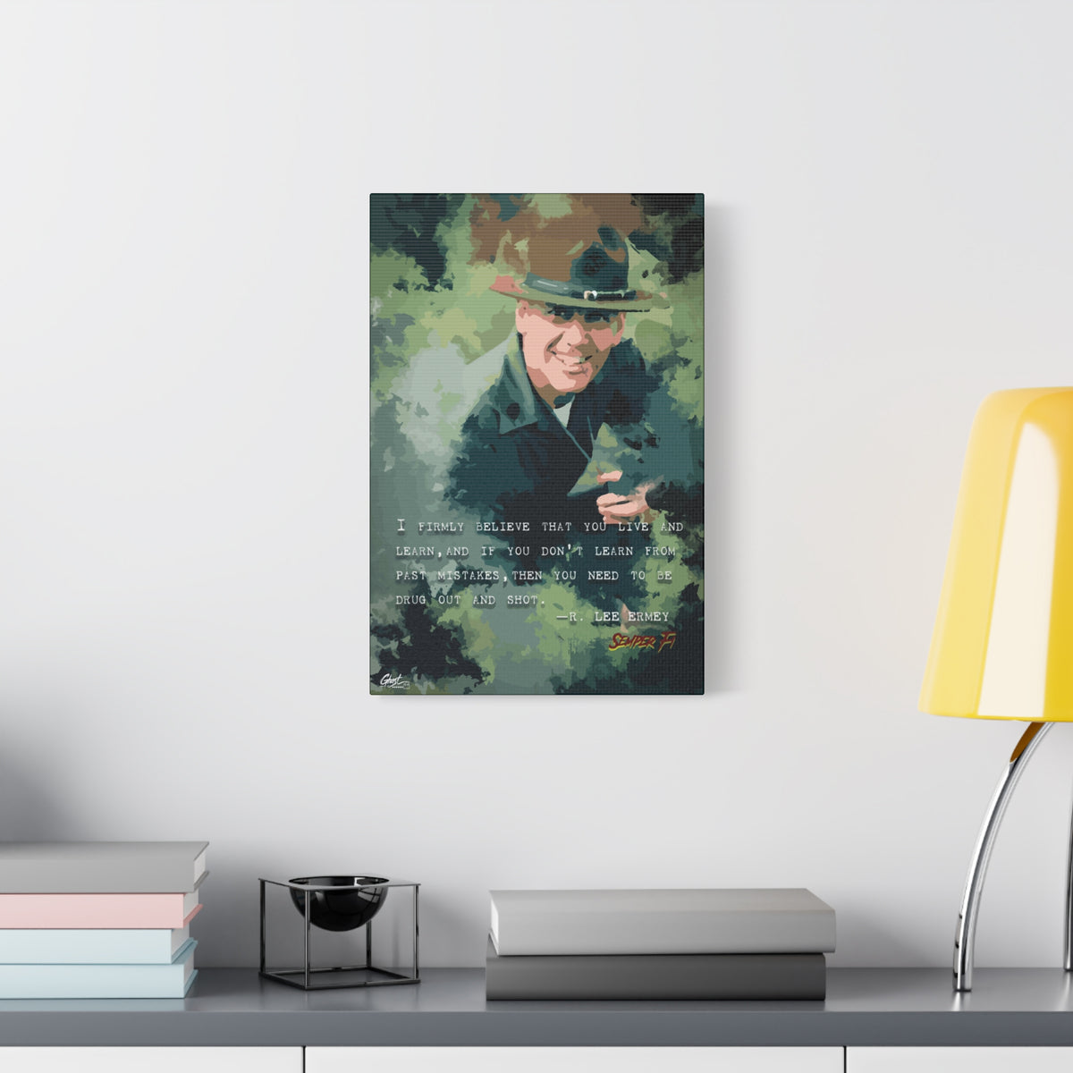 Live and Learn medium canvas beside a yellow desk lamp, grinning drill instructor in olive and forest green