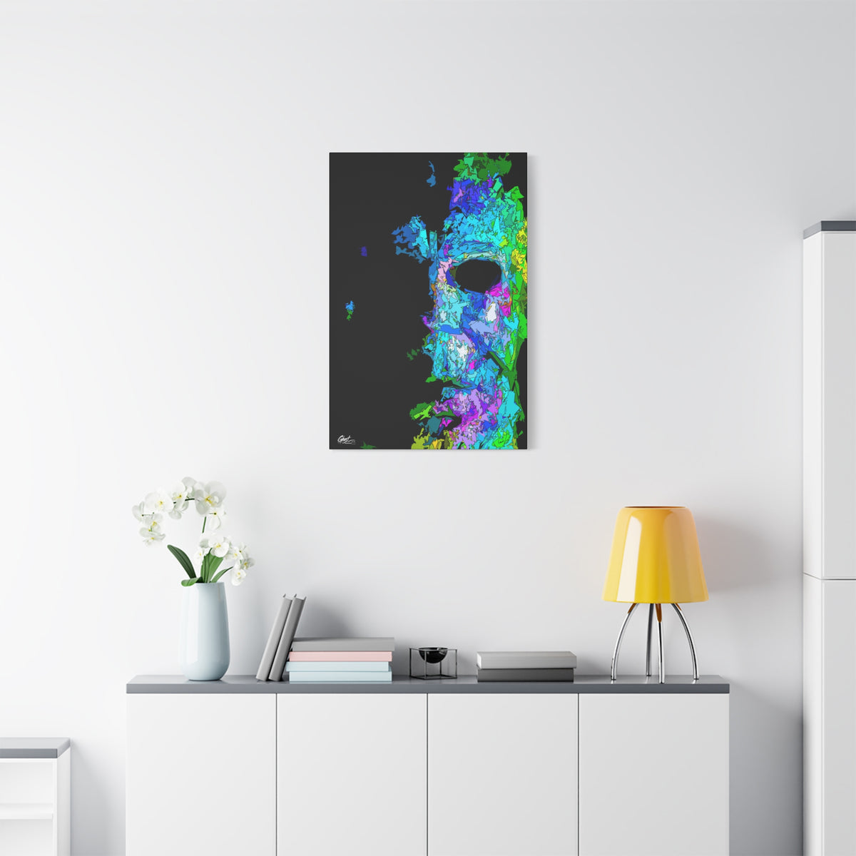 Stalk at Night, Prism Edition small canvas above a white sideboard and yellow lamp, neon triangle-shard mask