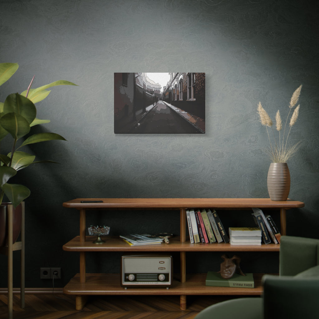 Charleston One Way medium canvas on a green-gray wall over bookshelves, moody alley with old brick walls and long shadows