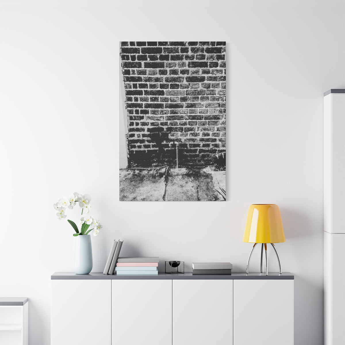 A Little Hiking in Charleston large canvas above a white sideboard and yellow lamp, stencil hiker on old brick