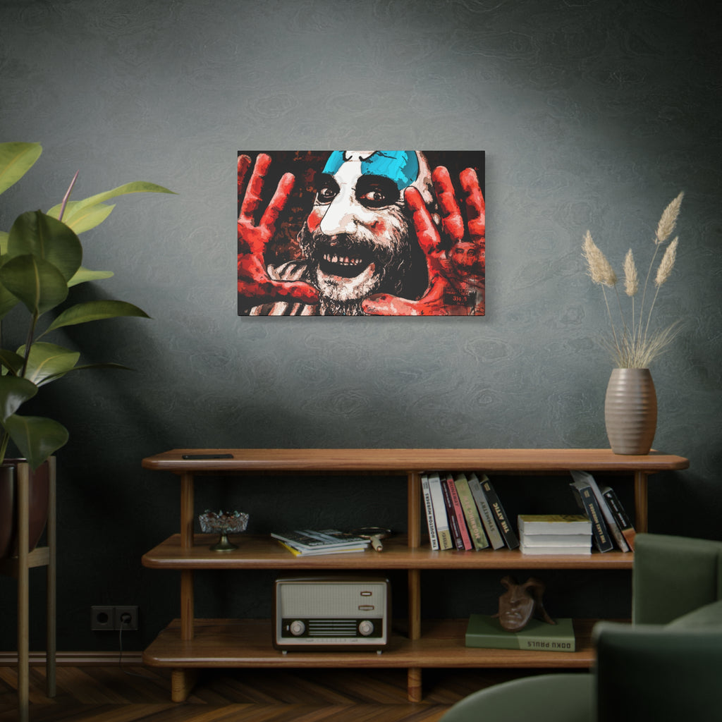 Don't Turn Your Back large canvas above a wooden bookshelf, grinning clown with blue-and-white face paint and red hands