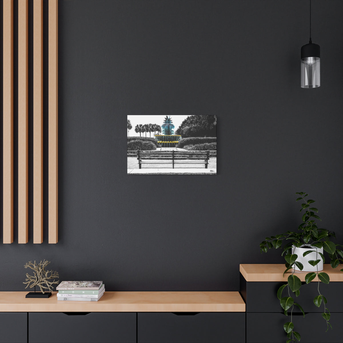The Pineapple of Peace canvas on a charcoal wall by wood slats, Southern hospitality pineapple in soft grays and greens