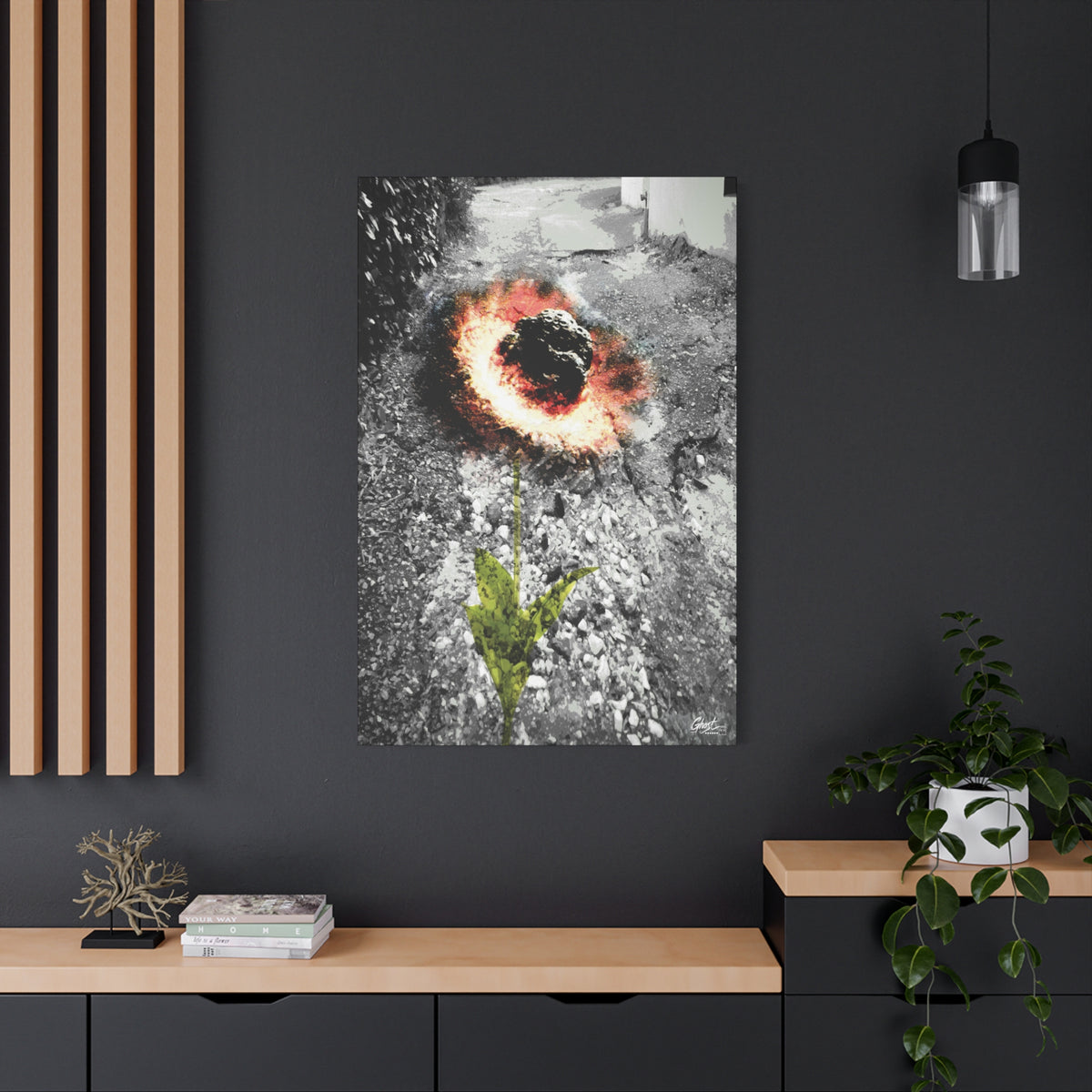 Meteor Flower large canvas on a charcoal wall by wood slats, pothole crater ringed in orange, red and yellow like a flower