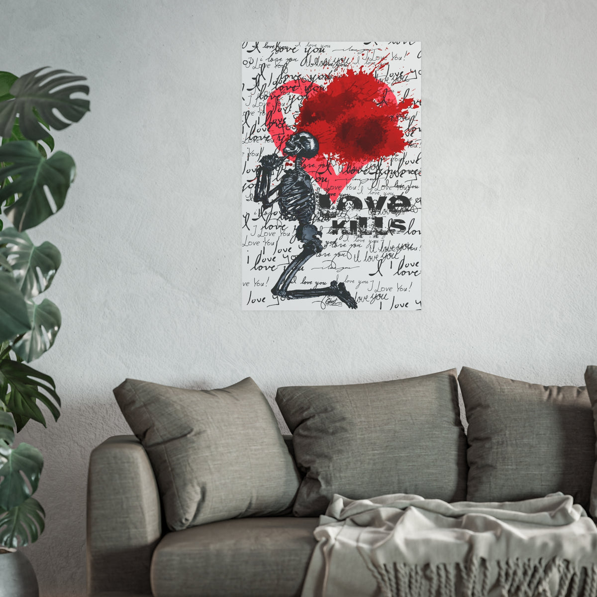 Love Kills Mindset Series poster in a living room with sofa and plant
