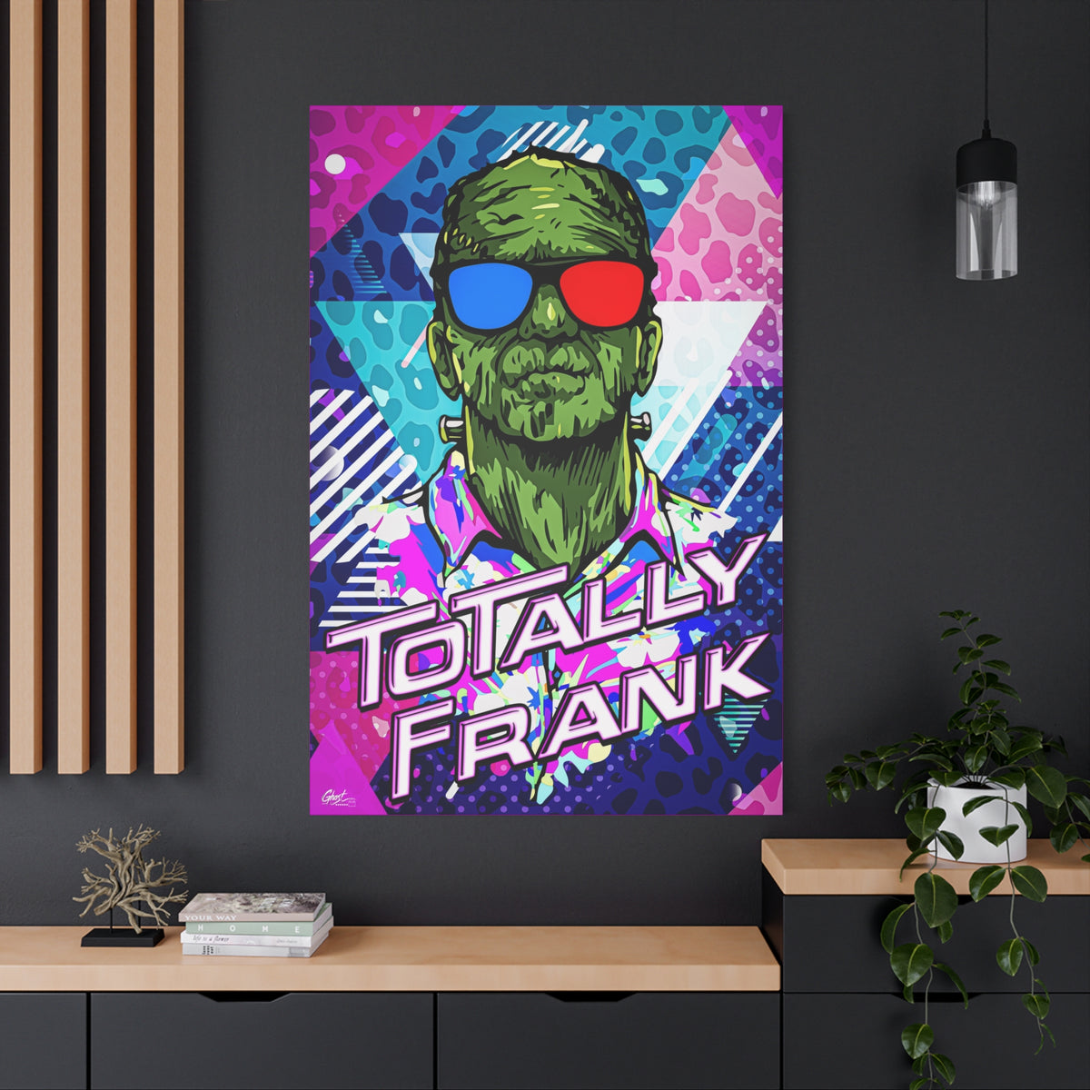 Monster Vibes oversized canvas on a charcoal wall over an oak shelf, neon pop-art monster with bold block lettering