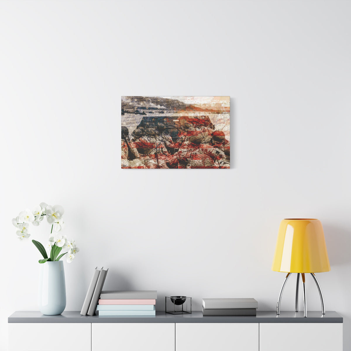 D-Day 75th Anniversary canvas over a console with white flowers, soldiers in a landing craft layered with stars and stripes