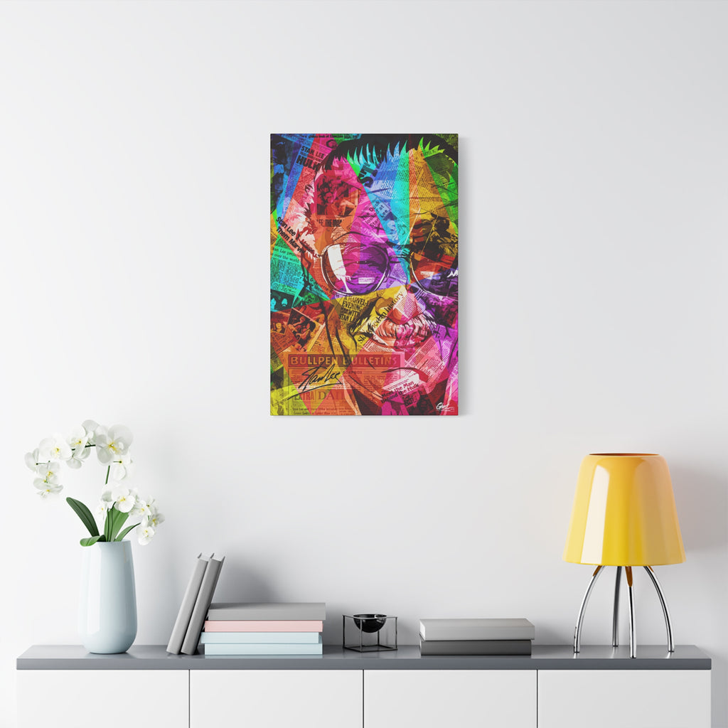 The Man the Myth the Legend large canvas on a white wall above a console, grinning collage portrait in pink, green and orange