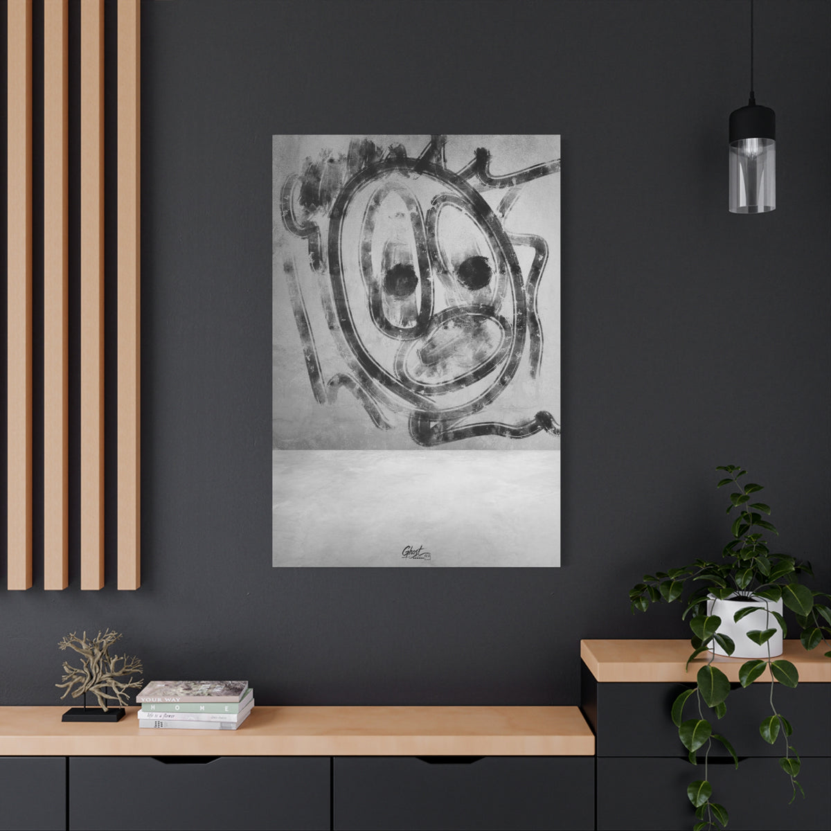Thinking Out Loud large canvas on a charcoal wall by wood slats, graffiti-style screaming face in charcoal strokes on concrete