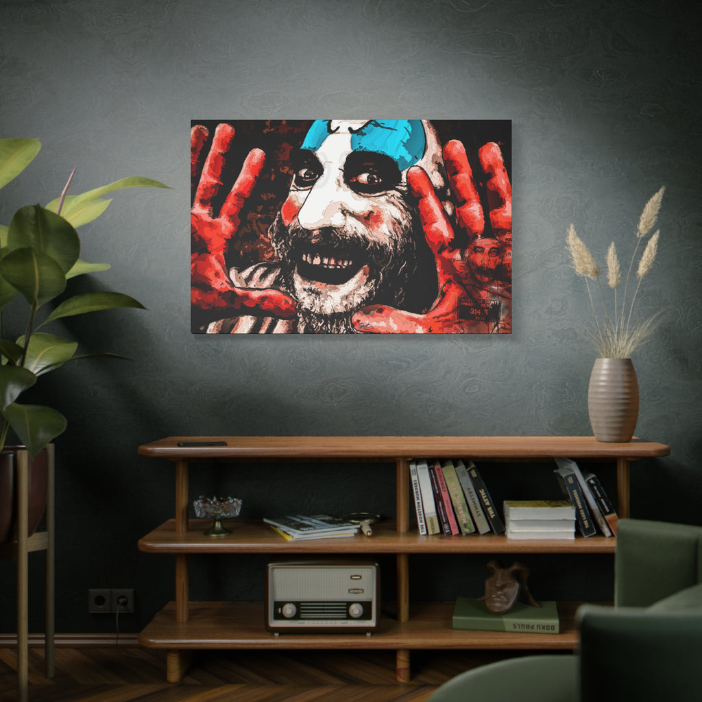 Don't Turn Your Back large canvas on a green-gray wall over bookshelves, high-contrast red and white clown portrait