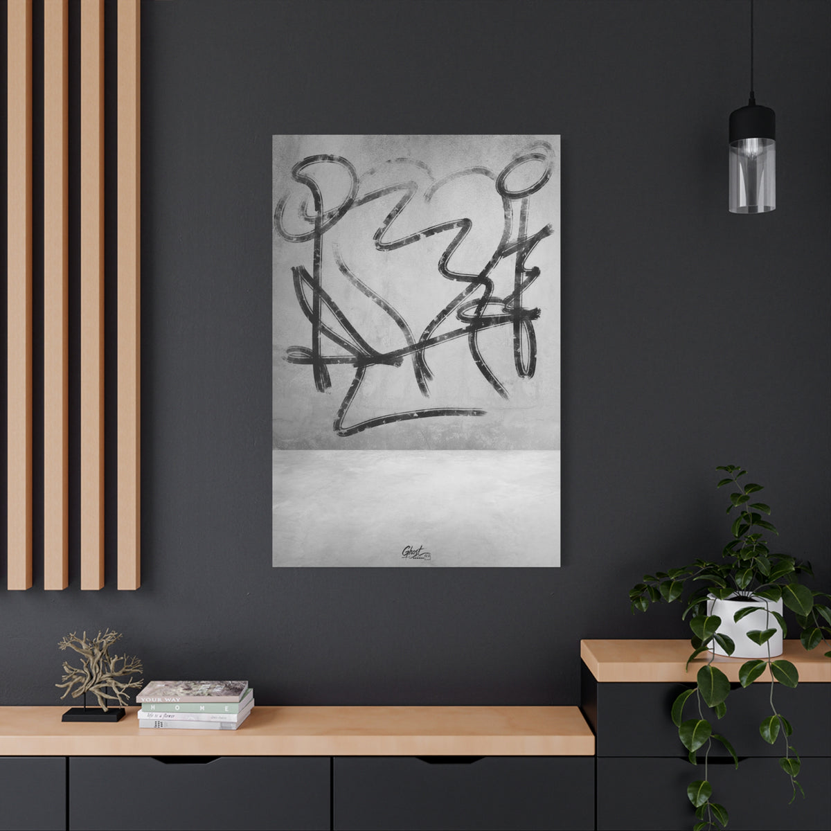 Heartbreak large canvas on a charcoal wall by wood slats, broad black charcoal-style strokes over a pale textured ground