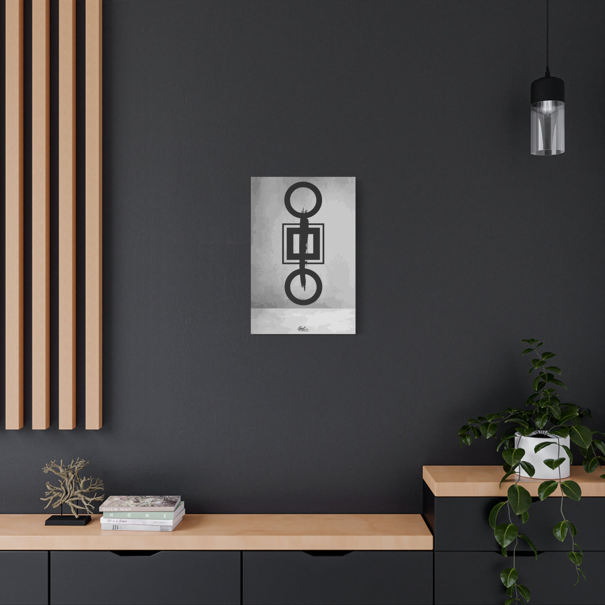 Down is Up medium canvas on a charcoal wall by wood slats, black-and-white geometric charcoal-style abstract