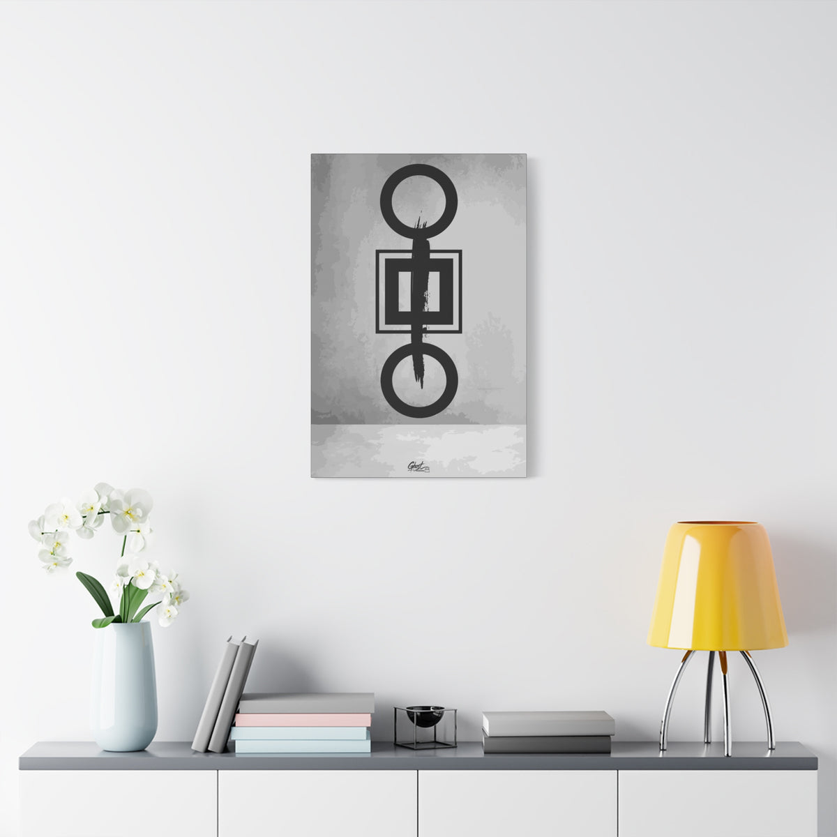 Down is Up medium canvas on a white wall above a console, black-and-white geometric charcoal-style abstract