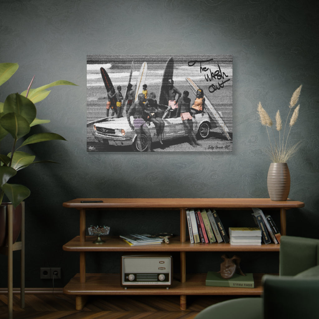 The Wash Out large canvas on a green-gray wall over bookshelves, grainy beach-day photo with a surfboard-loaded convertible