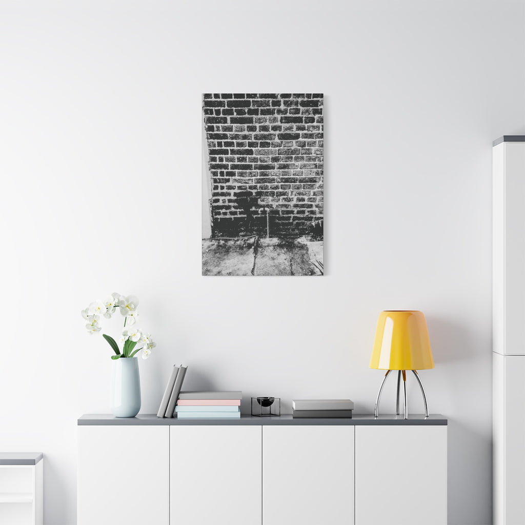 A Little Hiking in Charleston small canvas above a white sideboard and yellow lamp, stencil hiker on old brick