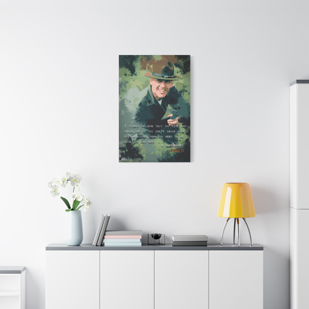 Live and Learn small canvas above a white sideboard and yellow lamp, grinning drill instructor in olive and forest green
