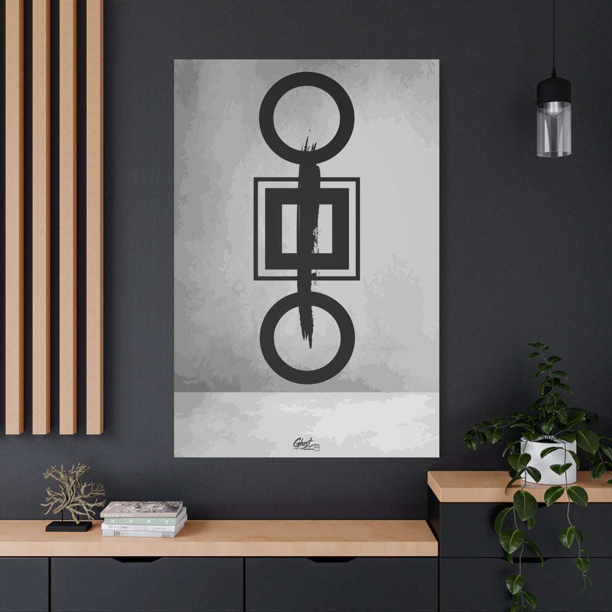 Down is Up oversized canvas on a charcoal wall over an oak shelf, black-and-white geometric charcoal-style abstract