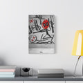 X'd Out small canvas beside a yellow desk lamp, black brushstroke doodles with a red mask emblem