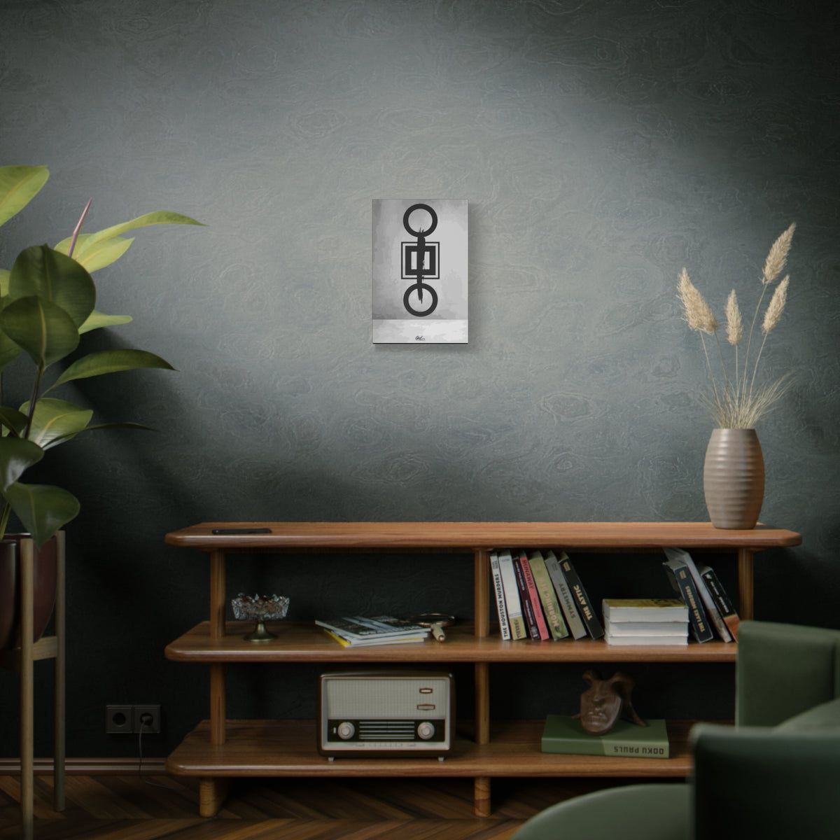 Down is Up small canvas on a green-gray wall over bookshelves, black-and-white geometric charcoal-style abstract