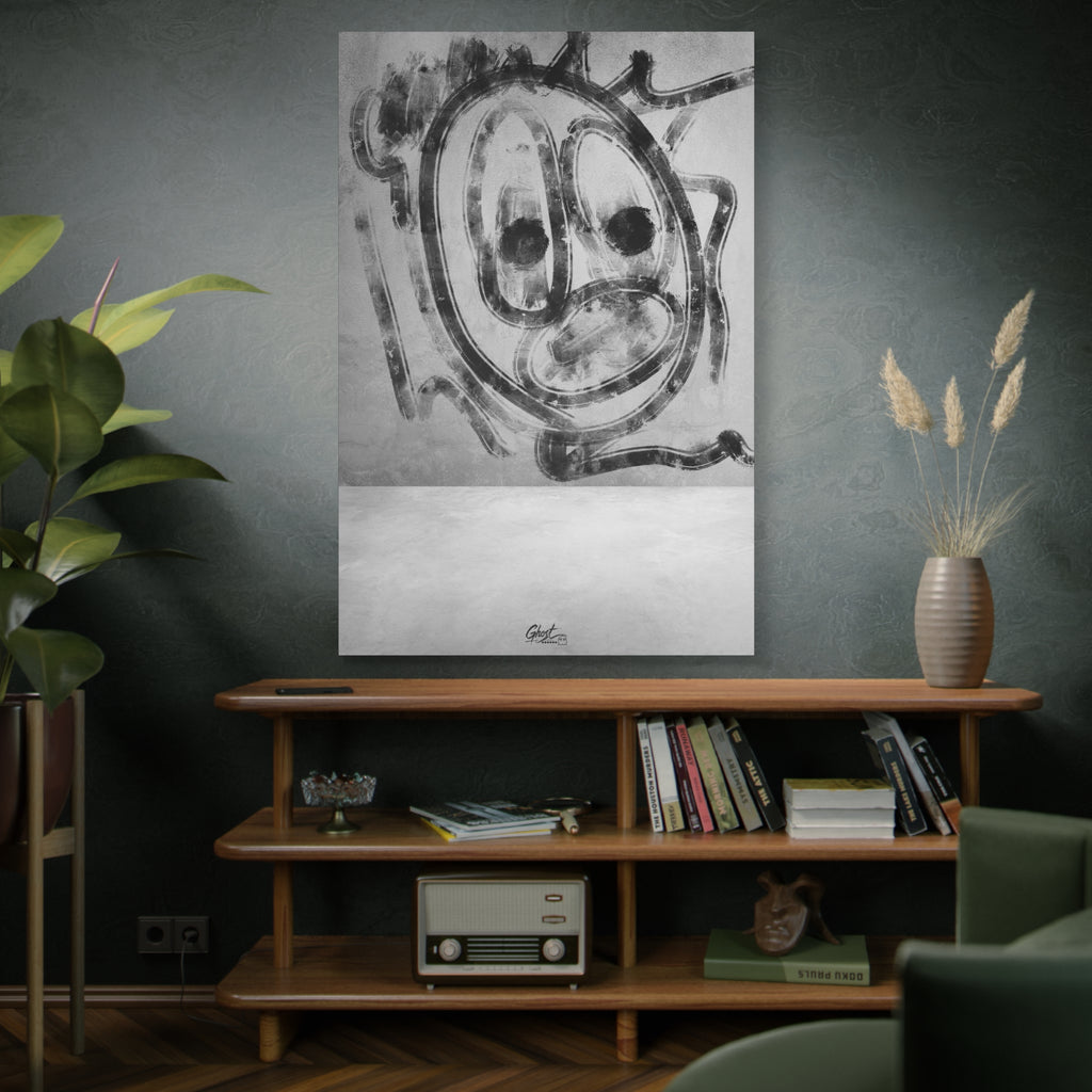 Thinking Out Loud oversized canvas on a green-gray wall over bookshelves, black-and-white abstract face with blurred edges
