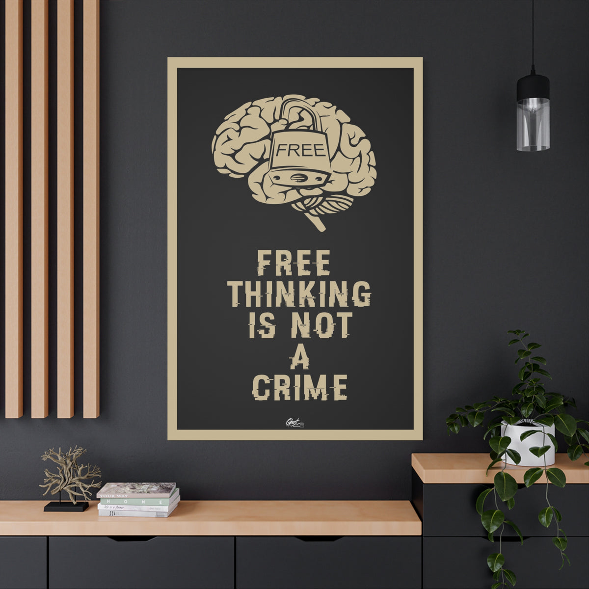Free Thinking Is Not a Crime oversized canvas on a charcoal wall by wood slats, padlocked brain in beige on charcoal