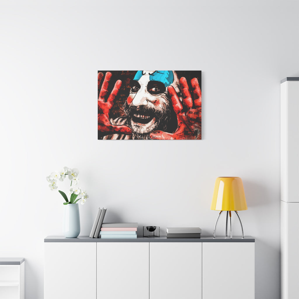 Don't Turn Your Back medium canvas above a white sideboard and yellow lamp, high-contrast red and white clown portrait