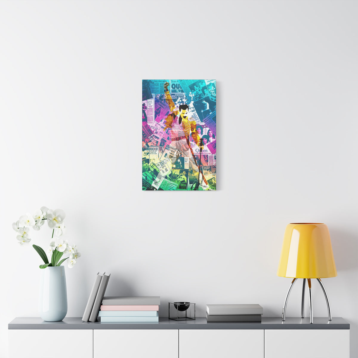 The Showman medium canvas over a console with white flowers, figure in a yellow jacket, fist raised, over newspaper collage