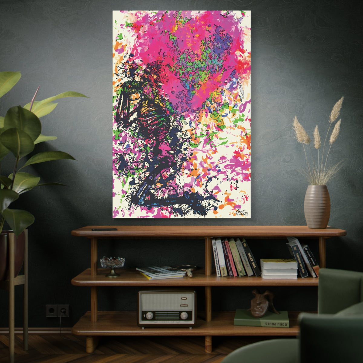 Waiting on My Love canvas on a green-gray wall over bookshelves, magenta and black splatter heart with a kneeling figure