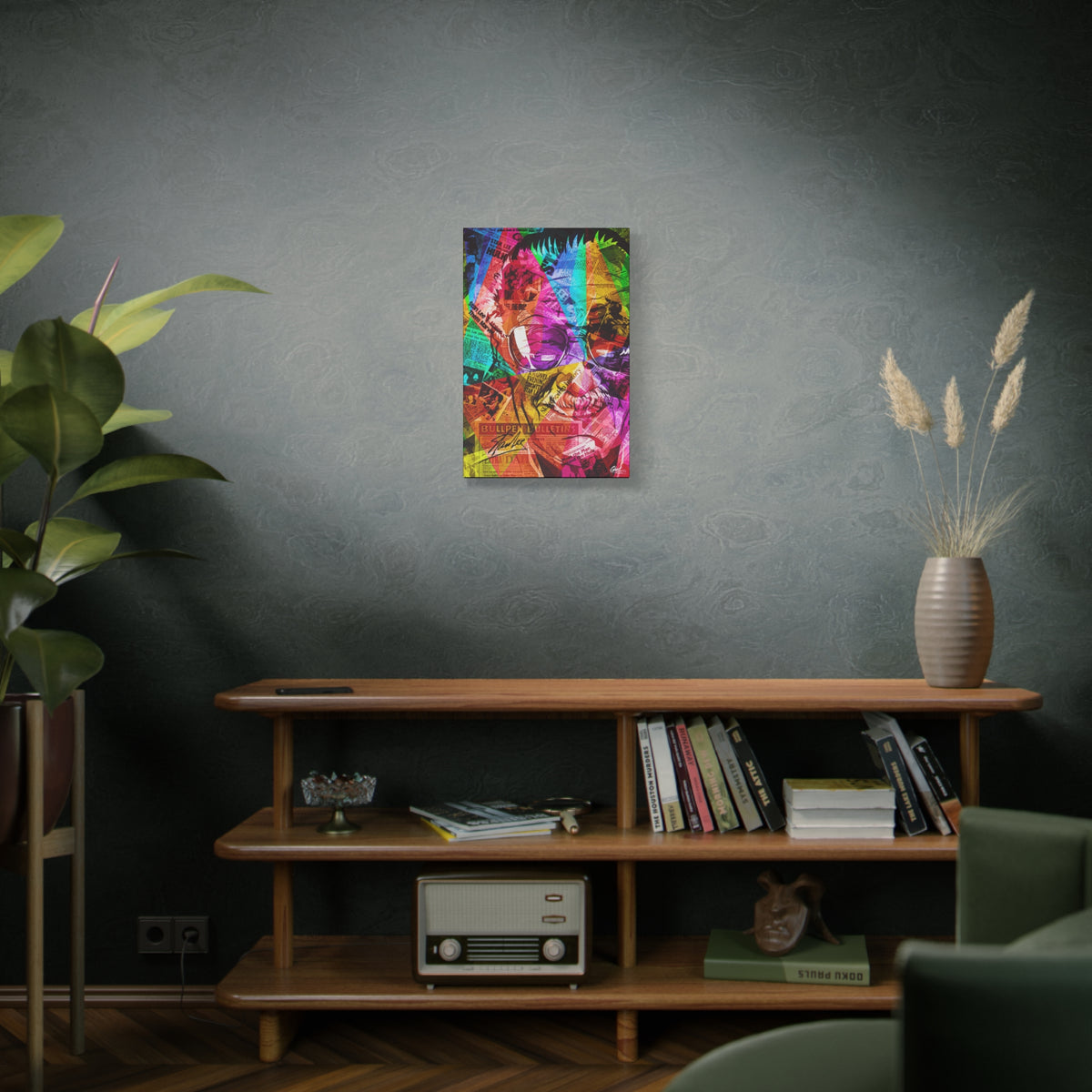 The Man the Myth the Legend medium canvas above a wooden bookshelf, grinning collage portrait in pink, green and orange