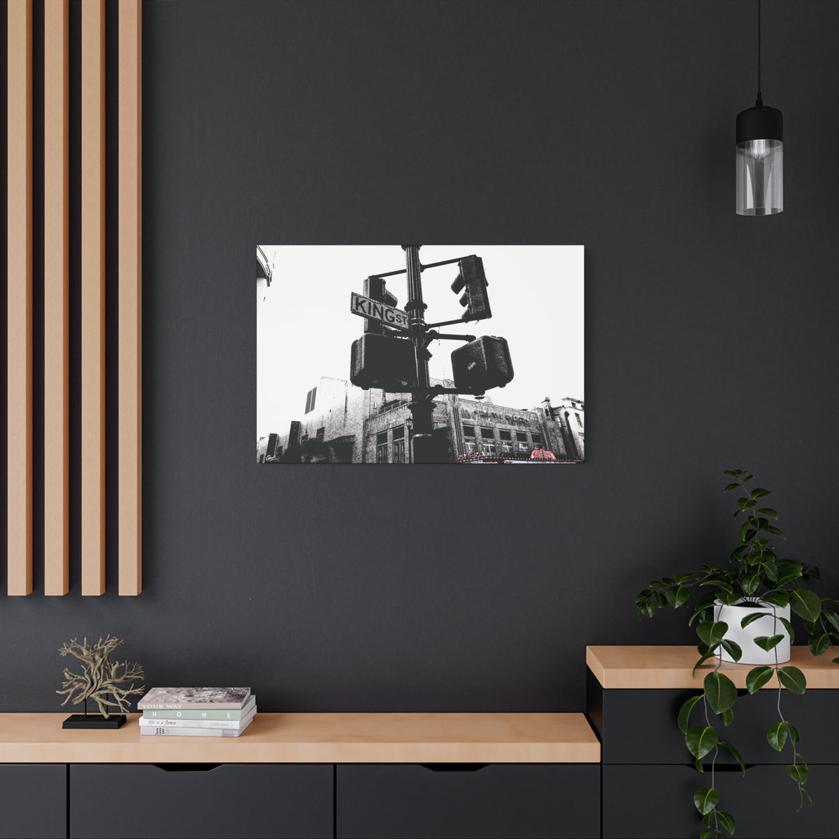King St canvas on a charcoal wall by wood slats, black-and-white King Street signals and the Riviera Theatre