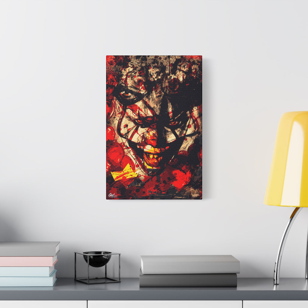 Down in a Drain medium canvas beside a yellow desk lamp, leering clown face in distressed red, black and cream