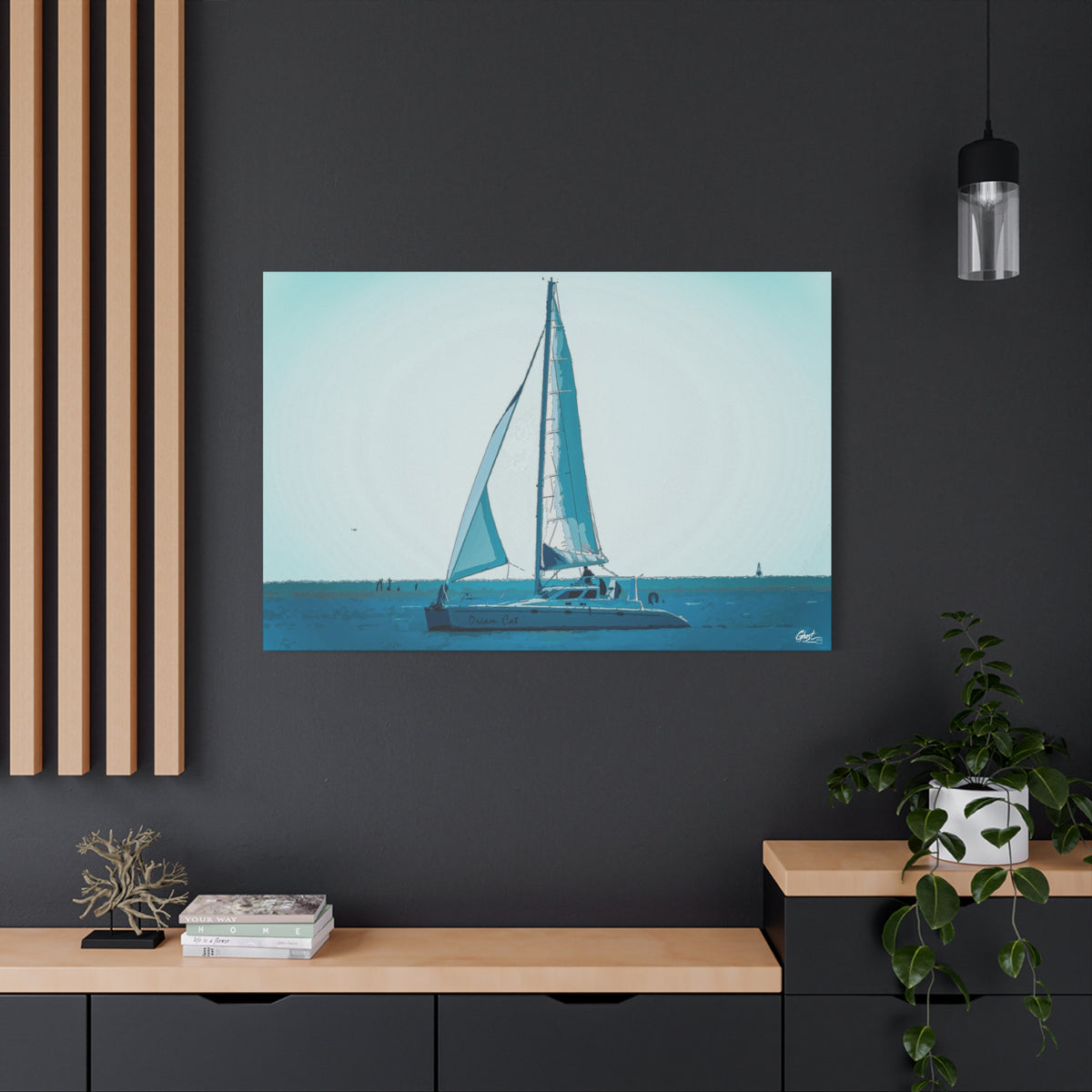 Freedom Sailing large canvas on a charcoal wall over an oak shelf, painterly teal seascape with a single sailboat