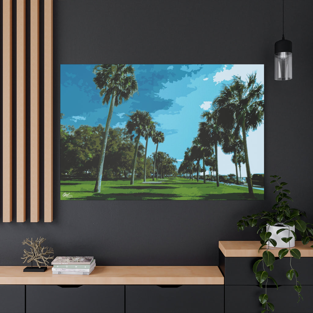 The Battery (Original) oversized canvas on a charcoal wall by wood slats, tall palms, green lawns and blue sky at the Battery