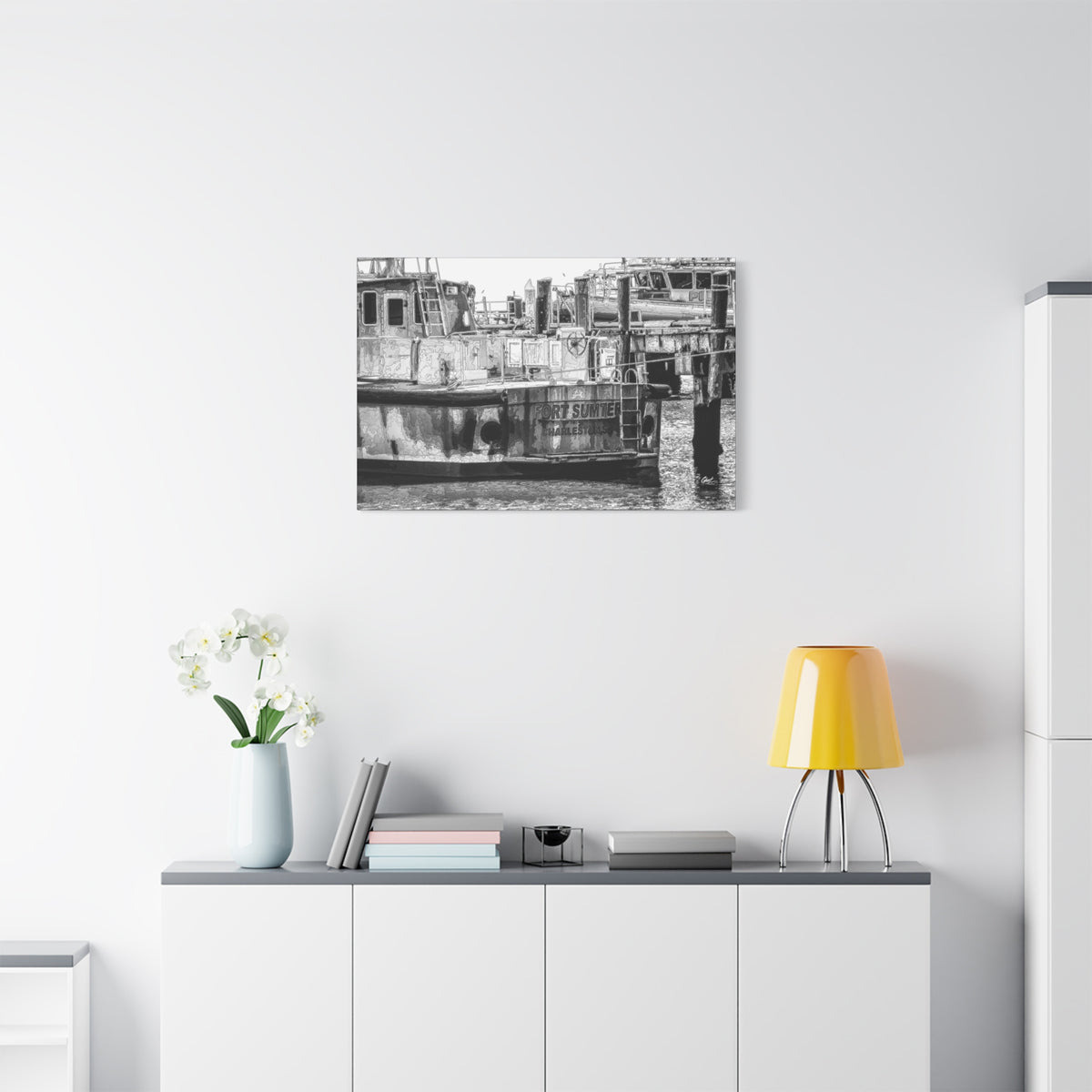 Fort Sumter Original medium canvas above a white sideboard and yellow lamp, weathered harbor boat sketched over in pen