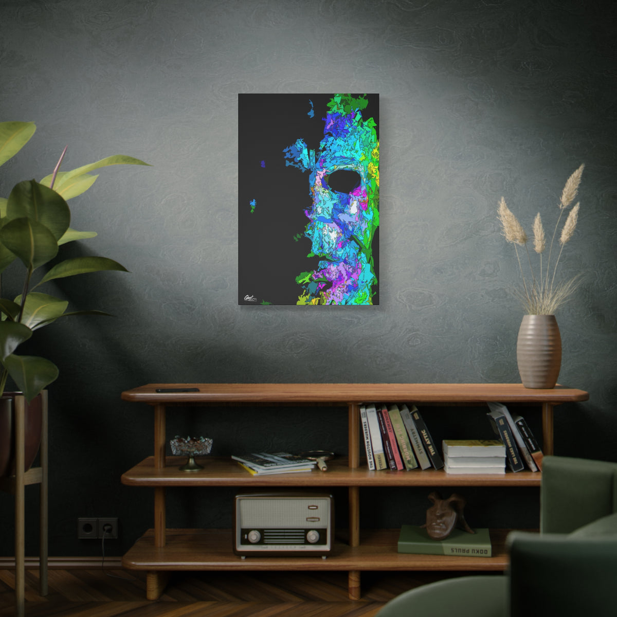 Stalk at Night, Prism Edition large canvas above a wooden bookshelf, fractured triangle mask in electric color on black