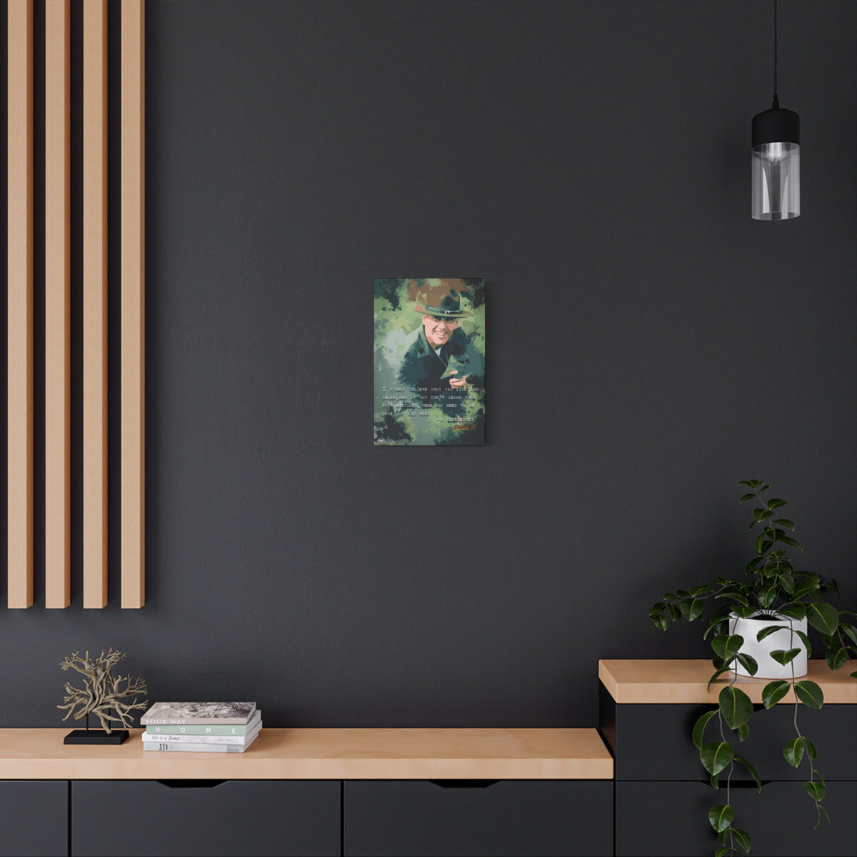 Live and Learn small canvas on a charcoal wall by wood slats, grinning drill instructor in olive and forest green