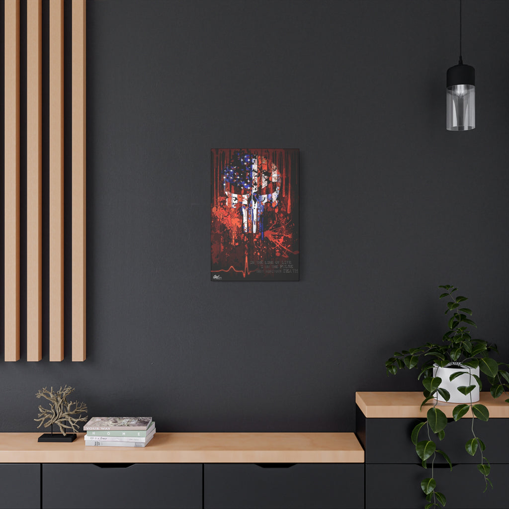 The Vigilante small canvas on a charcoal wall over an oak shelf, red, white and blue flag skull on black