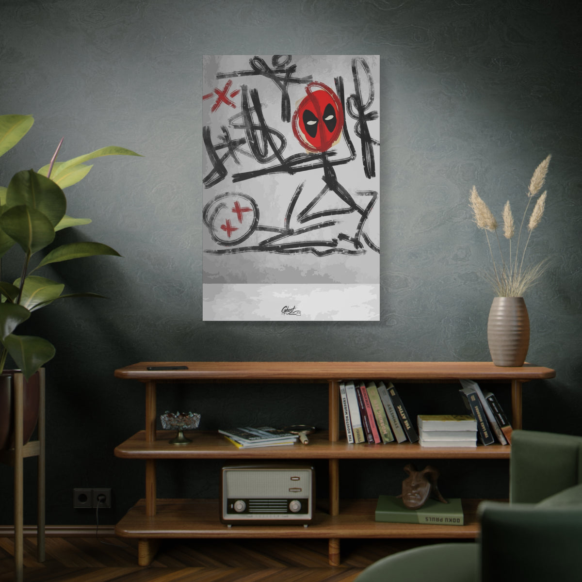 X'd Out large canvas above a wooden bookshelf, black brushstroke doodles with a red mask emblem