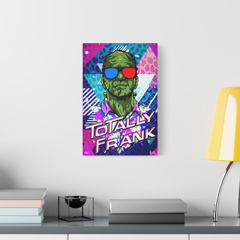 Monster Vibes medium canvas beside a yellow desk lamp, green monster in red-and-blue 3D glasses and a tropical shirt