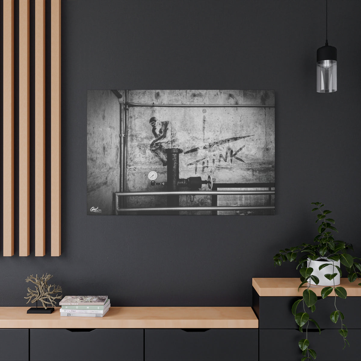 I Overthink large canvas on a charcoal wall over an oak shelf, gritty parking-garage wall with a stenciled THINK