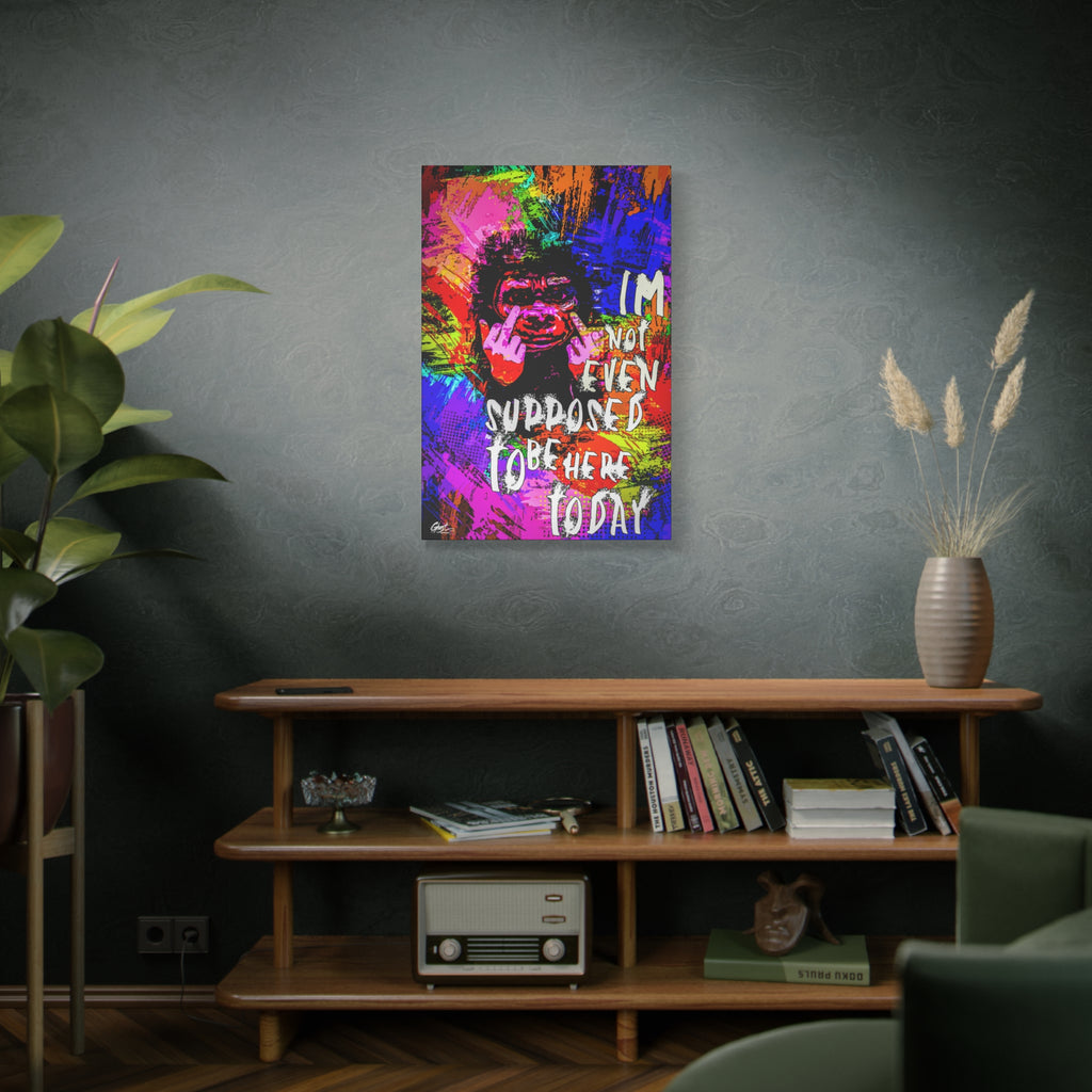 Not Even Supposed to Be Here canvas on a green-gray wall over bookshelves, grinning ape in hot pink and neon brushstrokes