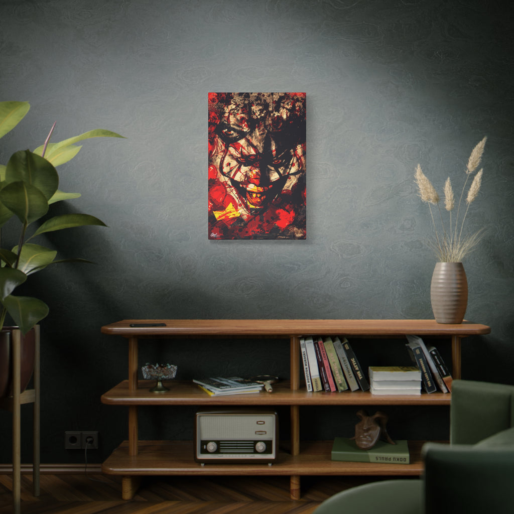 Down in a Drain medium canvas on a green-gray wall over bookshelves, leering clown face in distressed red, black and cream