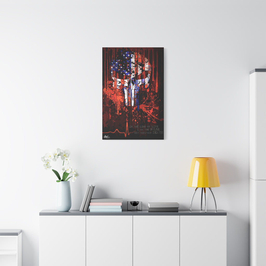 The Vigilante small canvas above a white sideboard and yellow lamp, skull emblem built from a distressed American flag