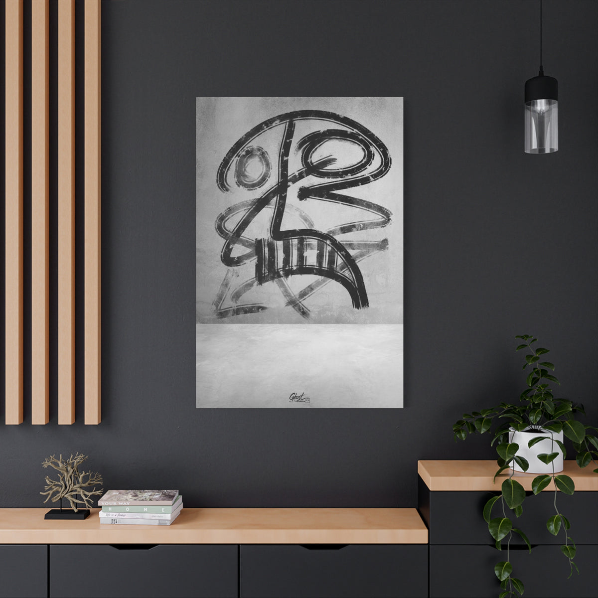 The Mask large canvas on a charcoal wall by wood slats, bold black brushstroke mask-like figure on a gray field